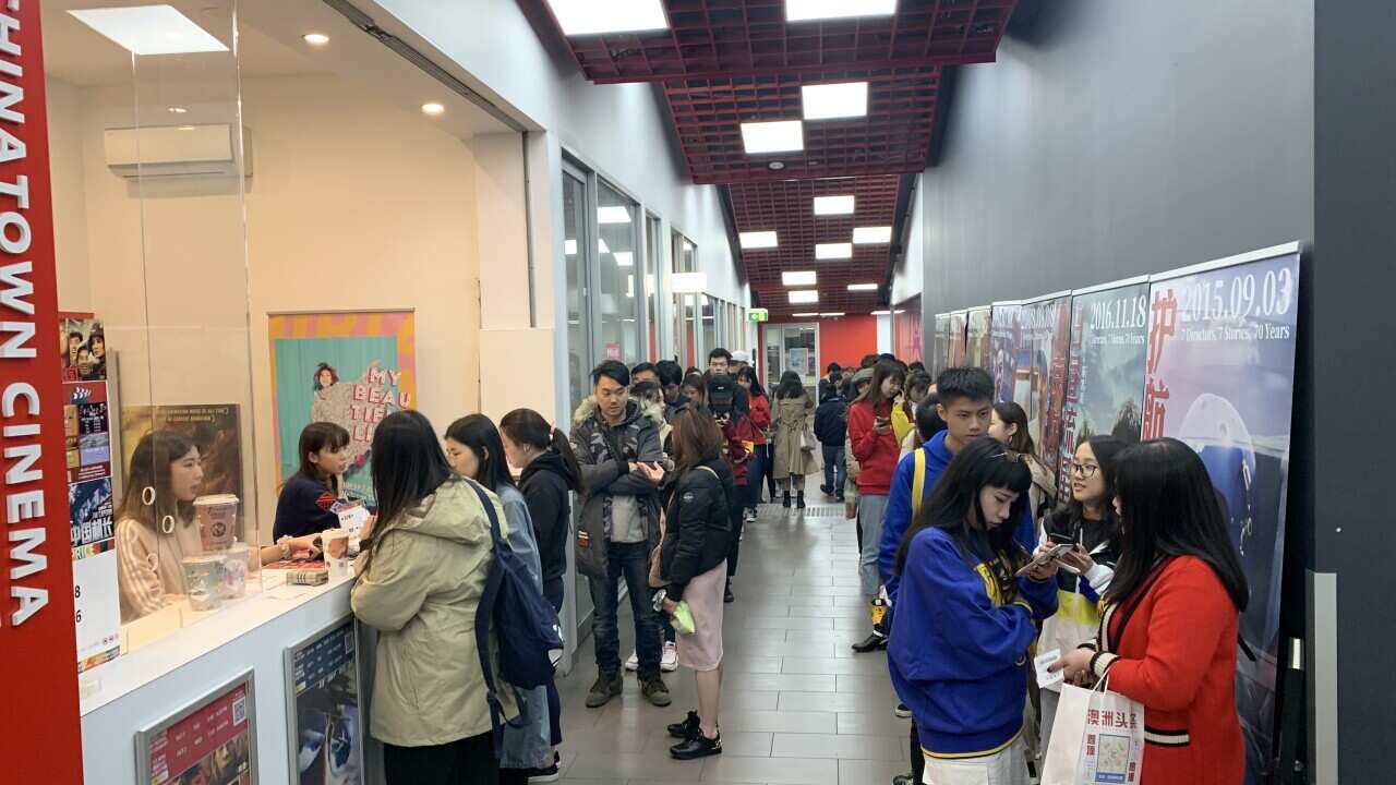 Chinese students outside China Town Cinema