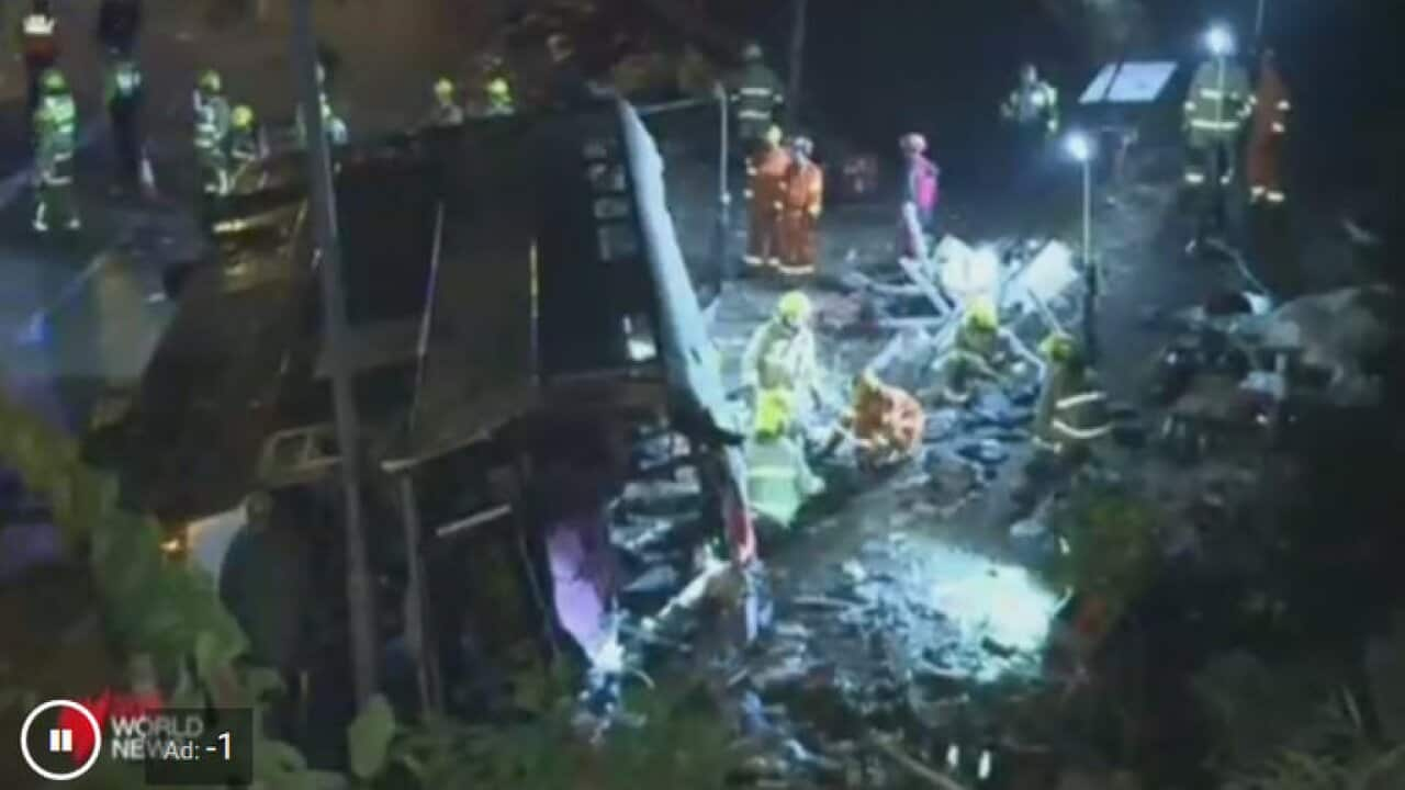 The bus flipped onto its side and smashed into a lamppost near the town of Tai Po in the northern New Territories.