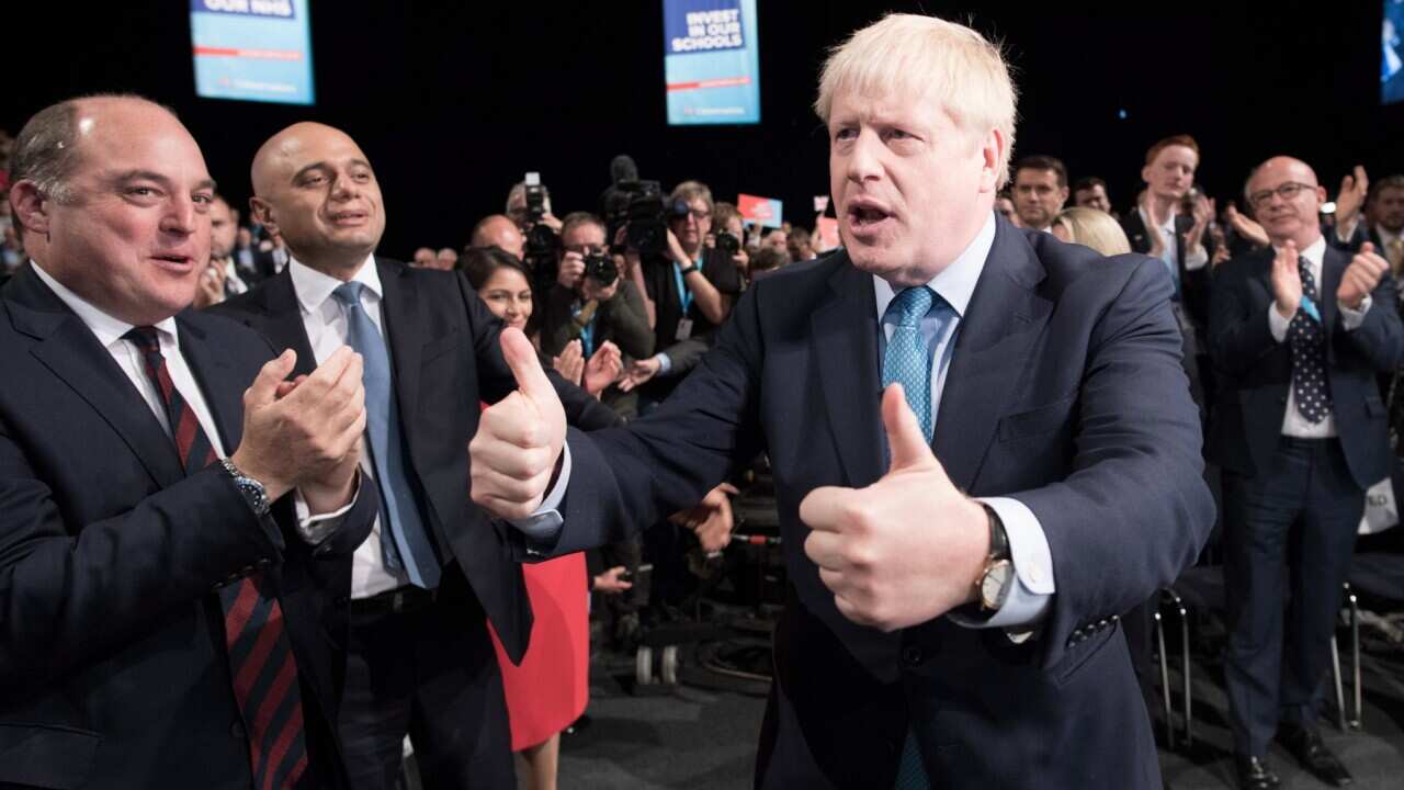 Prime Minister Boris Johnson gives a thumbs up after delivering his speech (AAP)