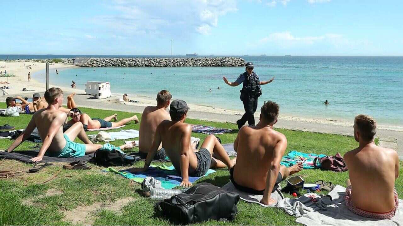 Police officers on a beach in Perth