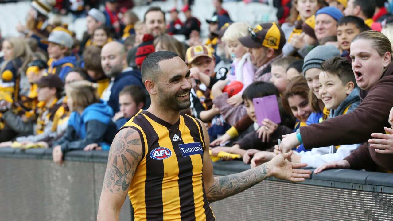 Shaun Burgoyne of the Hawks is seen with fans after winning the Round 20 AFL match between the Hawthorn Hawks and the Essendon Bombers at the MCG in Melbourne, Saturday, August 4, 2018. (AAP Image/David Crosling) NO ARCHIVING, EDITORIAL USE ONLY