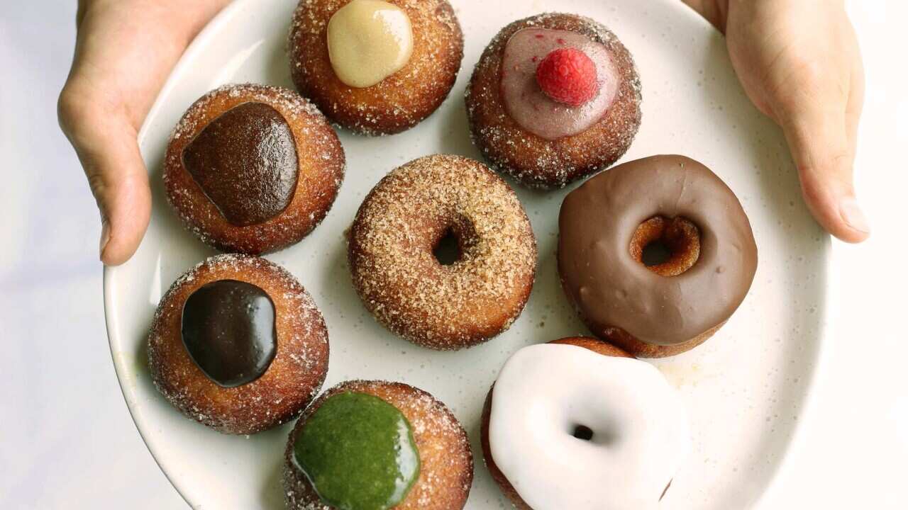 Ozone's sourdough doughnuts (which come in sesame, matcha, Japanese curry and other flavours) are fried to order in Comeco Foods' new takeout store in Sydney.