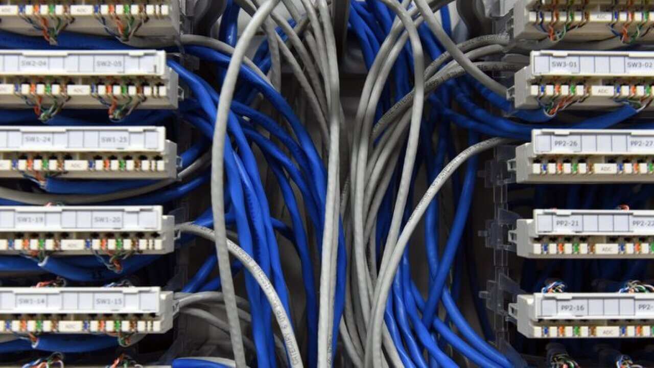 Ethernet data cables are seen in a server room in Canberra, Tuesday, May 3, 2016. (AAP Image/Mick Tsikas) NO ARCHIVING