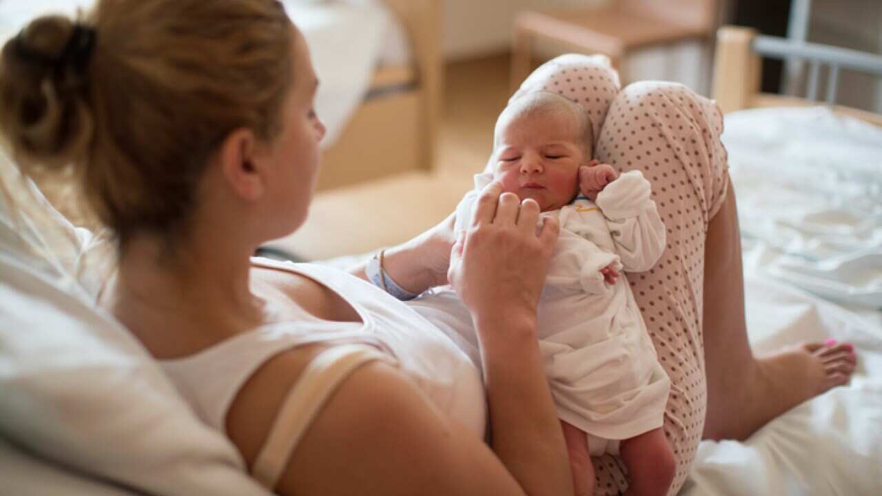 woman with newborn baby