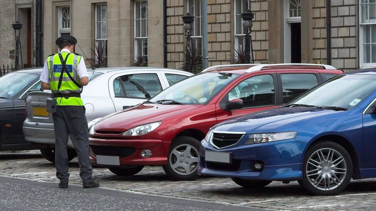 parking attendant, traffic warden, getting ticket fine mandate