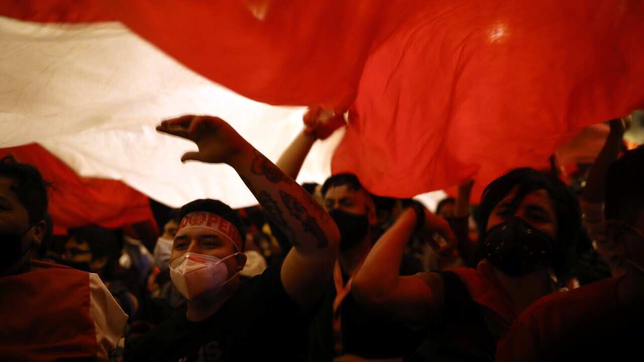 Protesters against the removal of President Martin Vizcarra in Plaza San Martin in Lima, Peru, Thursday, Nov. 12, 2020. 