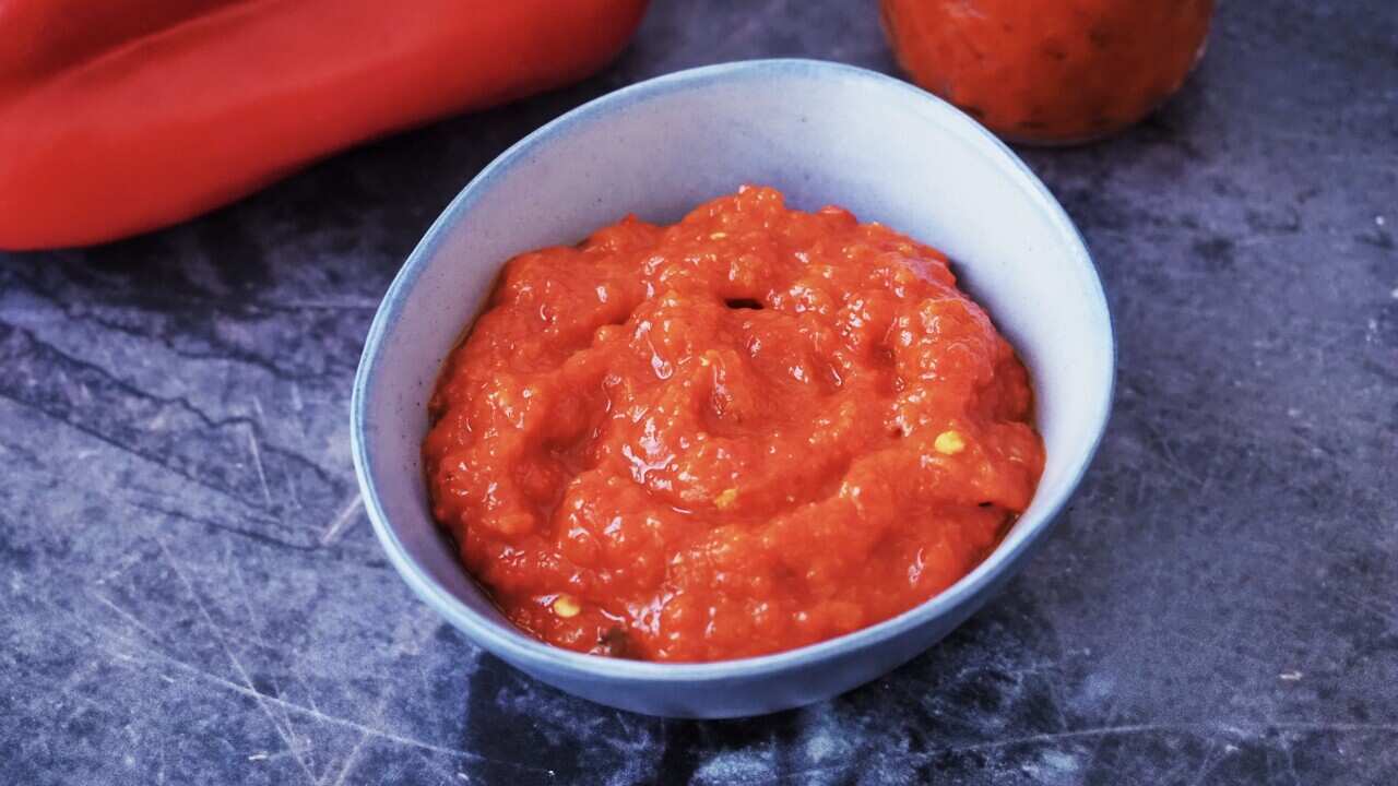 Ajvar, a Bosnian capsicum relish is served in a small bowl