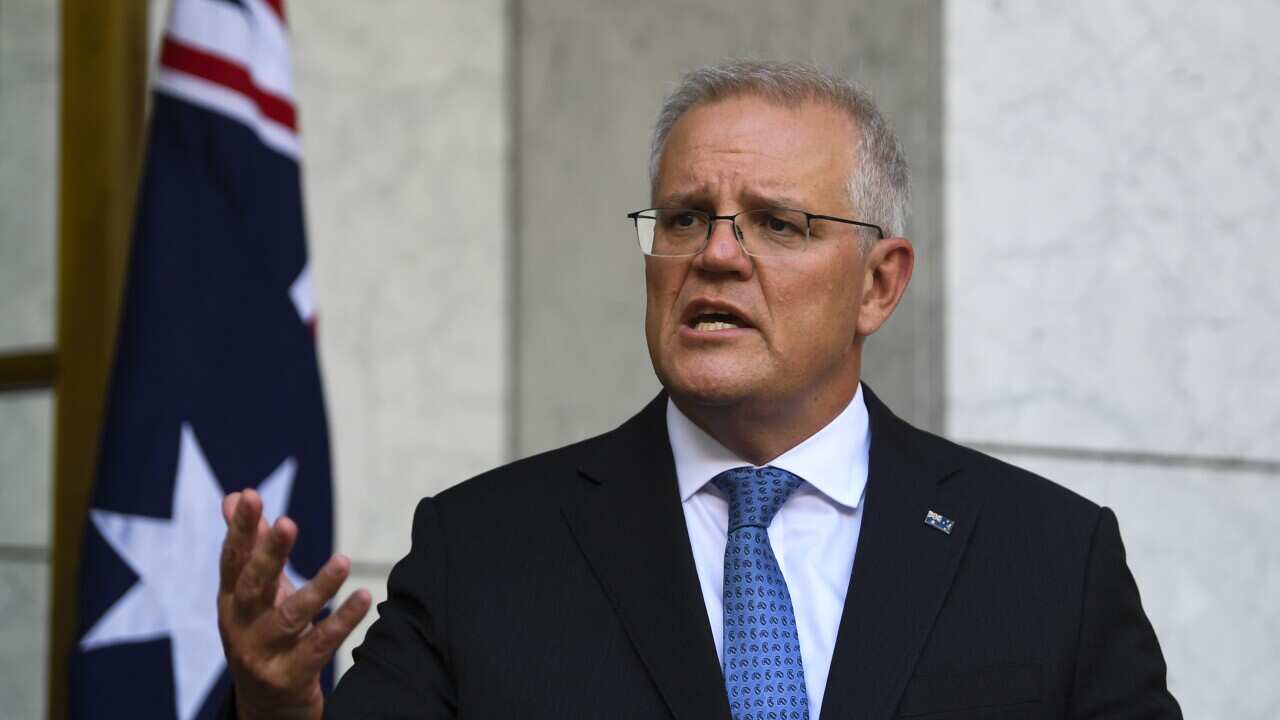 Prime Minister Scott Morrison speaks to the media during a press conference in Canberra, Monday, February 7, 2022.