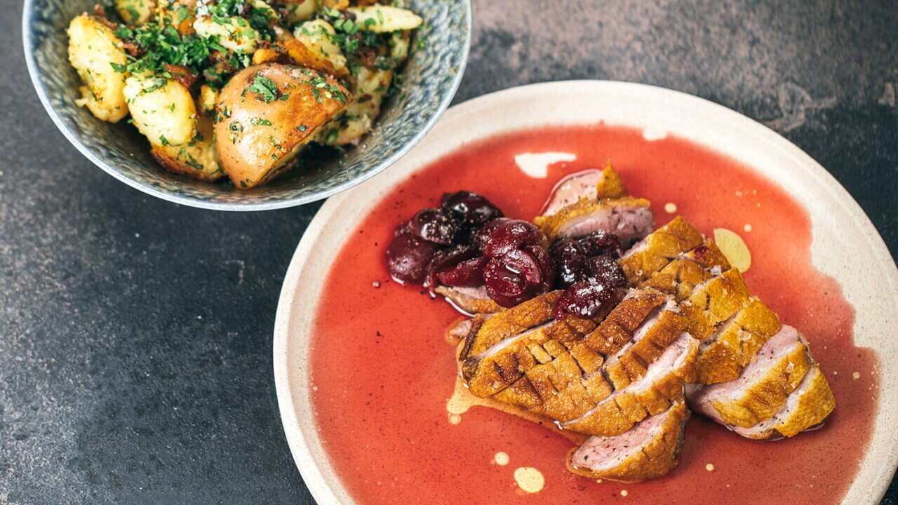 Pan-seared duck with cherries