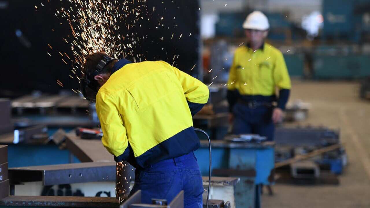 Workers are seen on the production floor at the Civmec Construction and Engineering facility in Perth, Friday, March 10, 2017. (AAP Image/Dan Peled) NO ARCHIVING