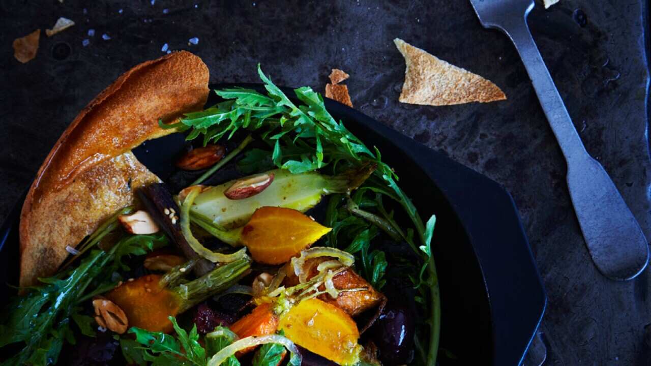 Egyptian carrot salad with pita, almonds and olives