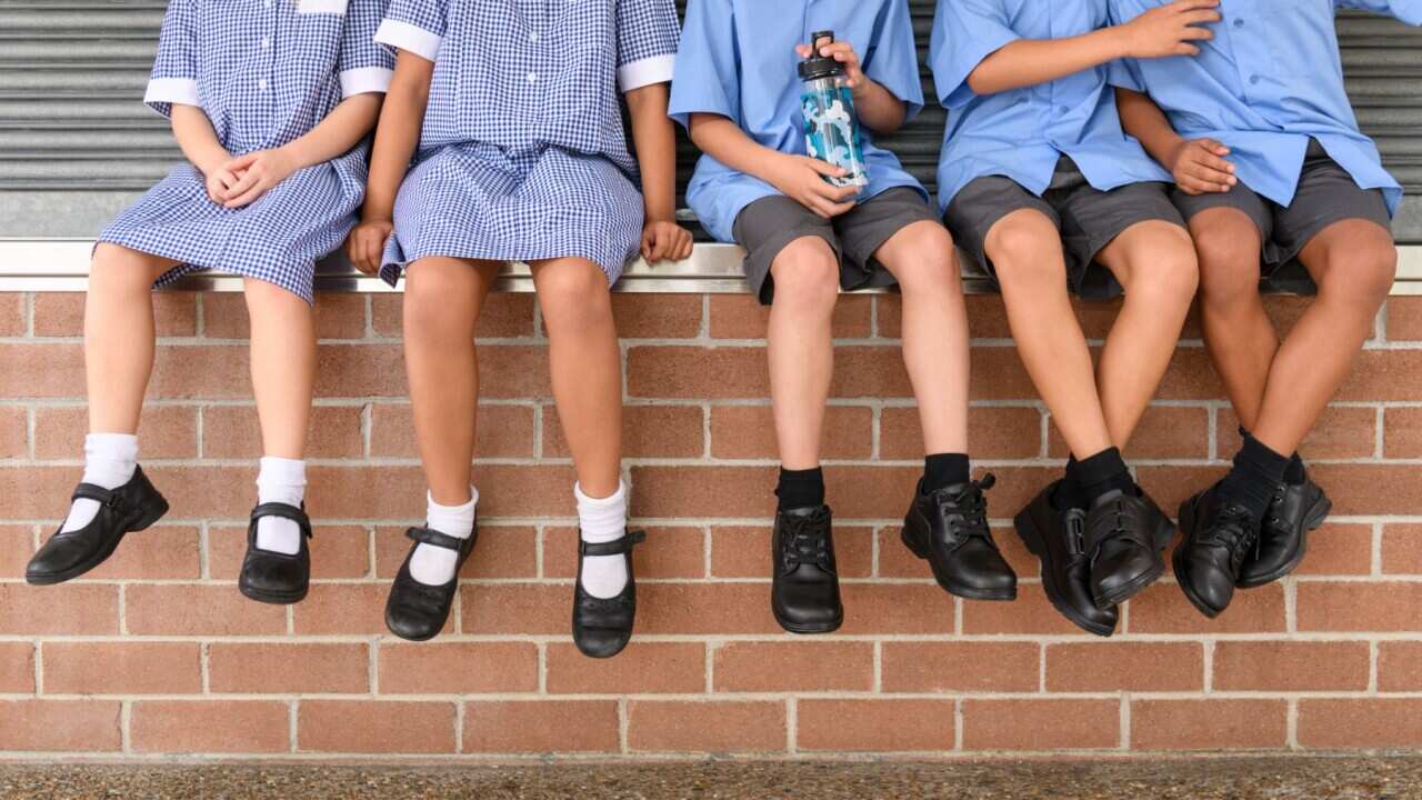 Low vaccination rates among primary school-aged children causing a spike in COVID cases in Queensland