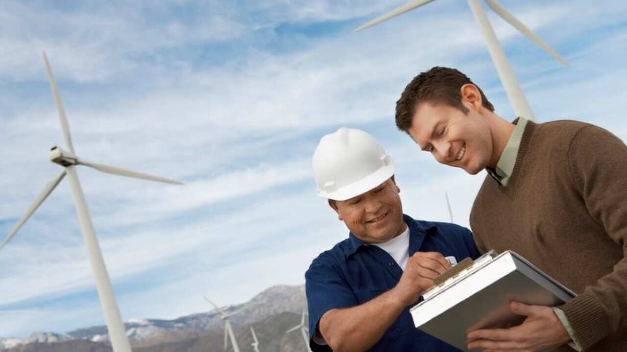 Engineers working at wind farm