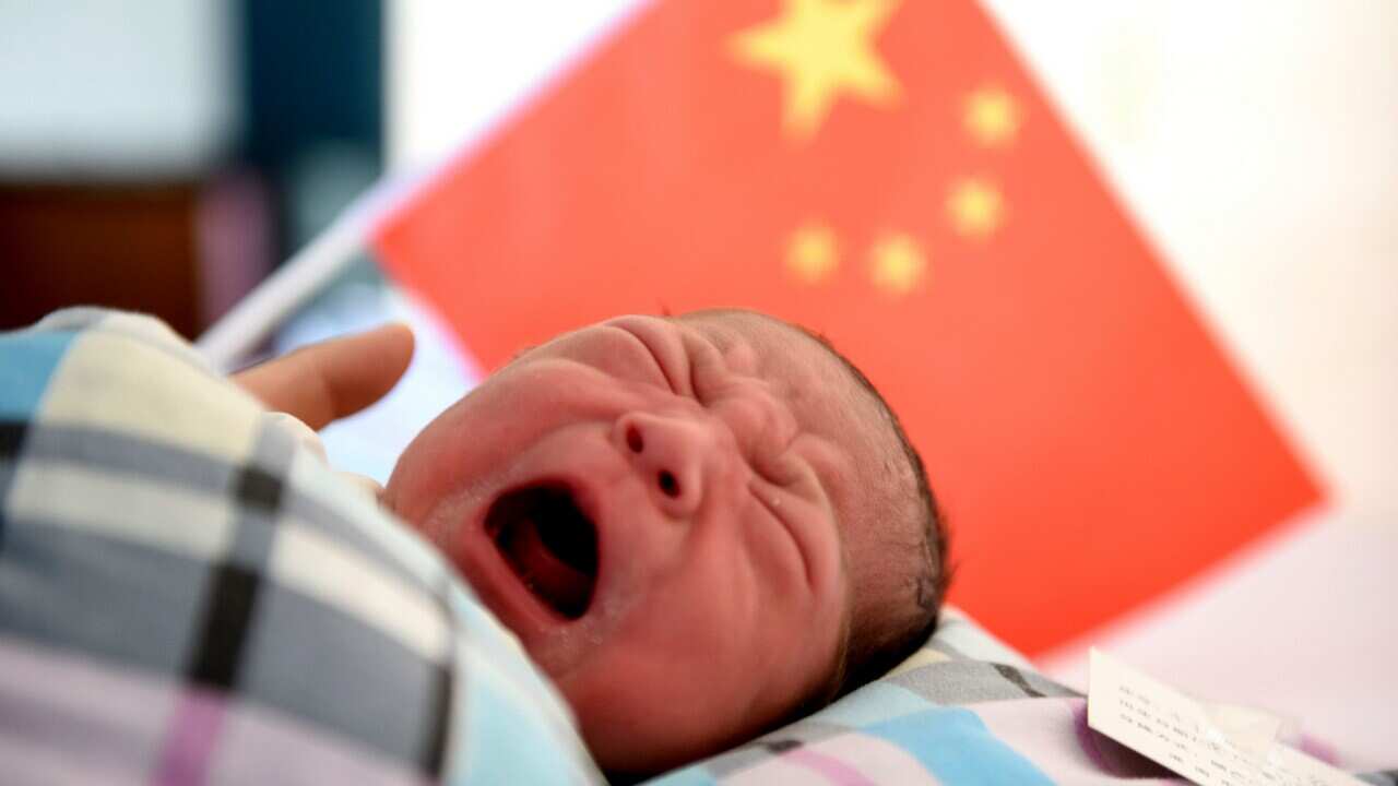 A Chinese newborn baby is seen at a hospital in Huainan city, east China's Anhui province, 1 October 2018. 