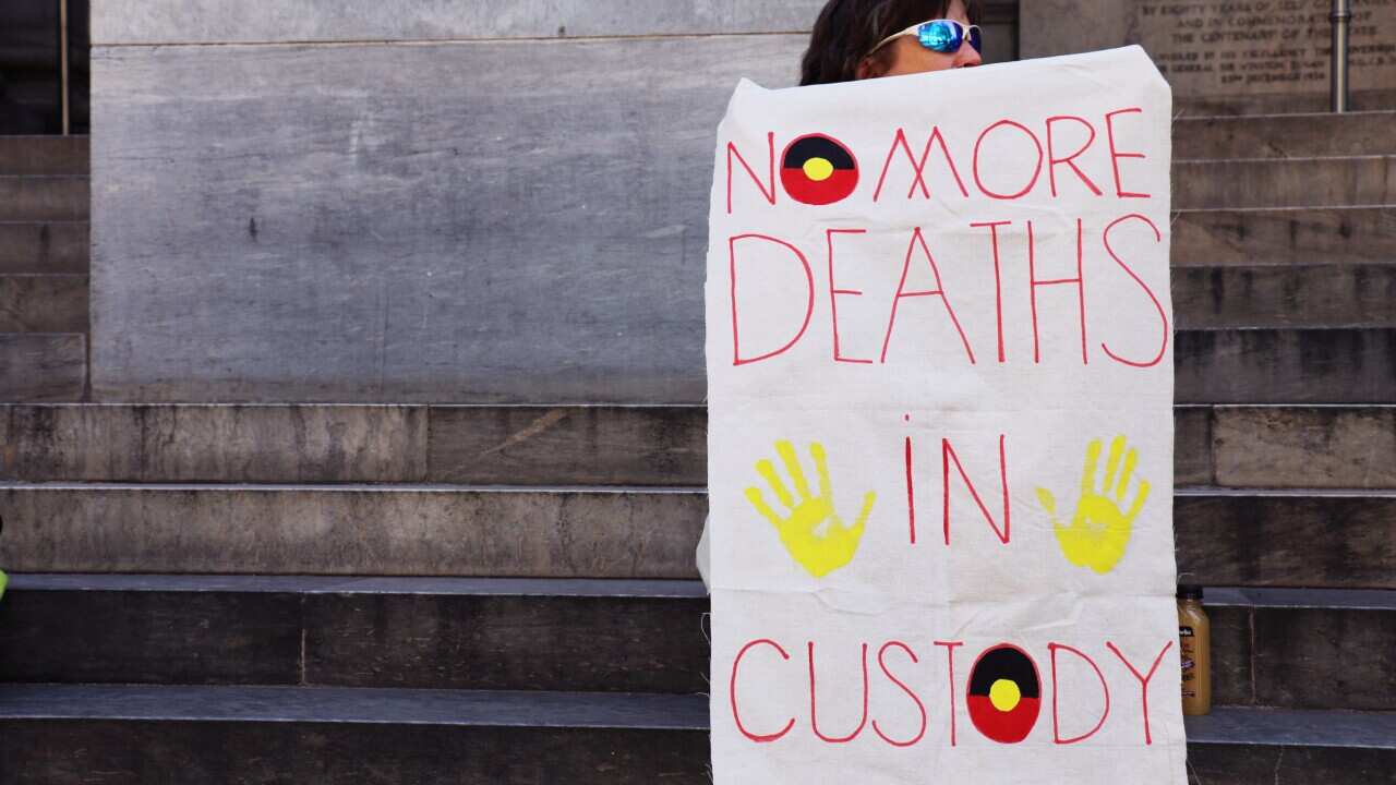 A 2014 protest demanding an independent inquest into the death , Ms Dhu.