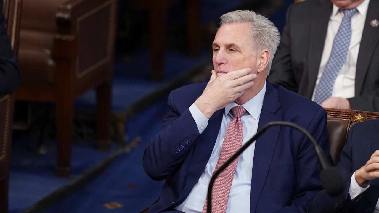 Kevin McCarthy listens as votes are cast for the next Speaker of the House
