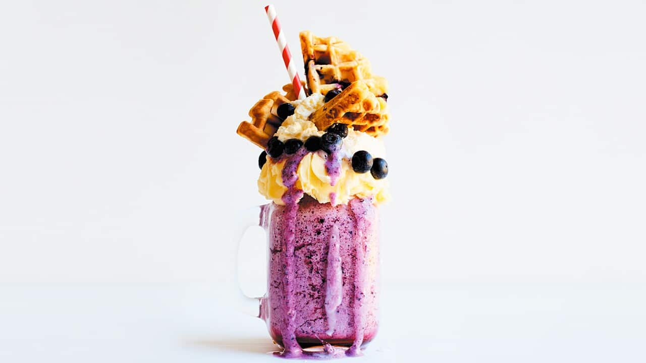 Sky-high blueberry waffle stack