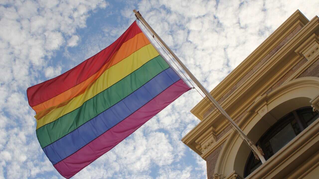 A rainbow pride flag flies on Broken Hill town hall in Broken Hill, Queensland, during the Broken Heel Festival, September, 2017. (AAP image/Rebecca Gredley) NO ARCHIVING