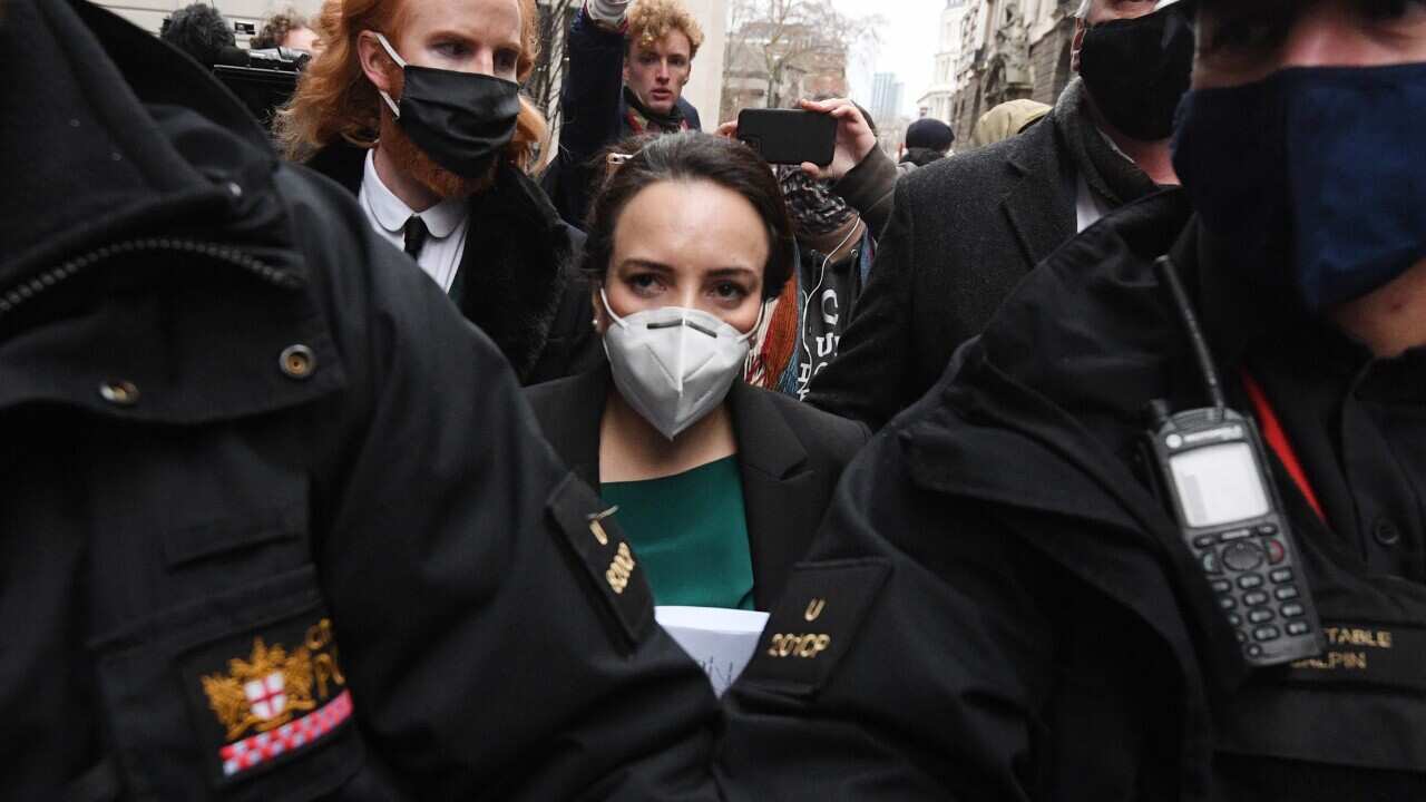 Stella Morris, partner of WikiLeaks founder Julian Assange, leaves the Old Bailey court in central London.