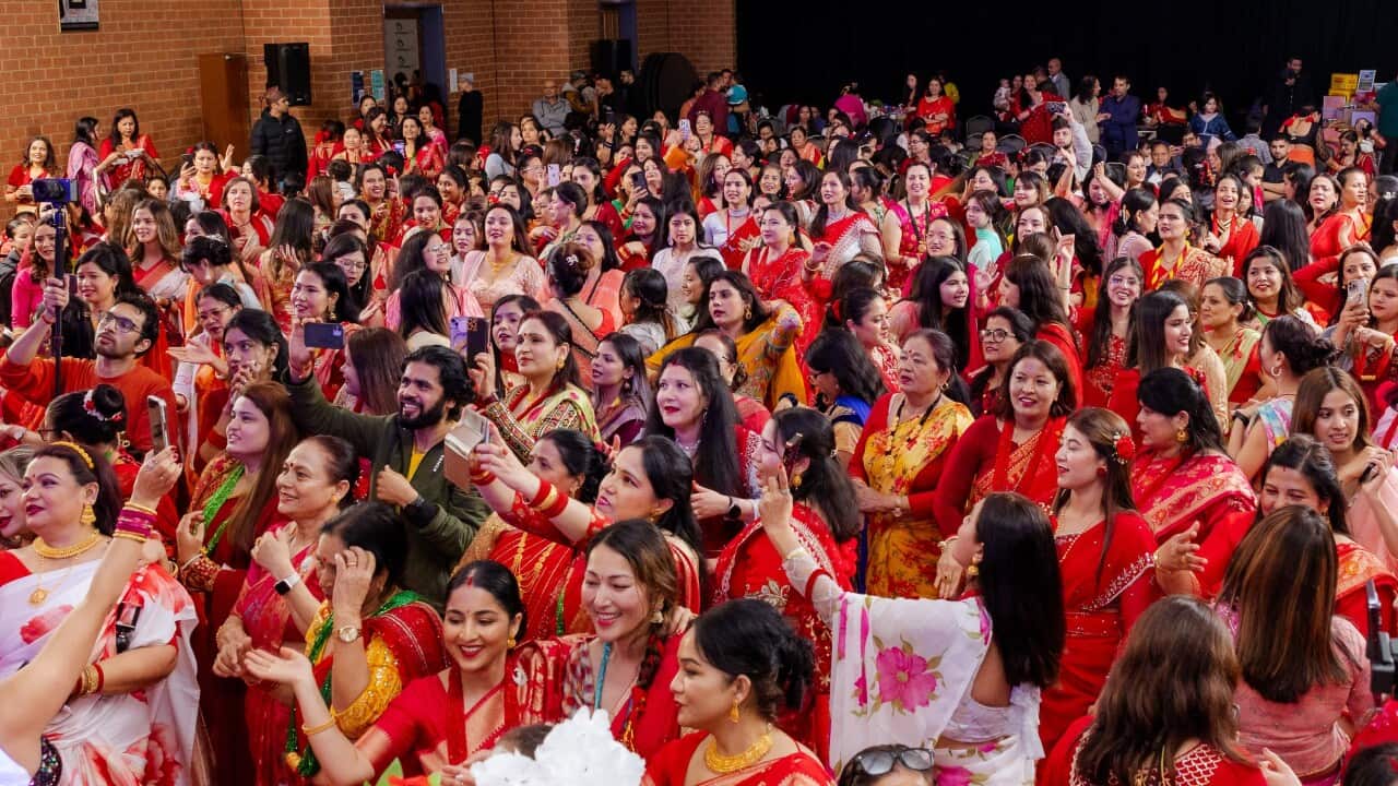Women dancing at a Teej celebration in Melbourne.