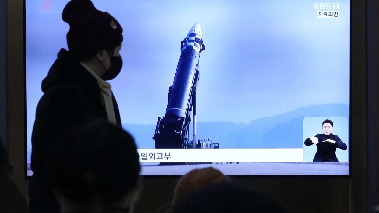 A file image of North Korea's missile is shown during a news program at the Seoul Railway Station in Seoul on 18 February 2023. 