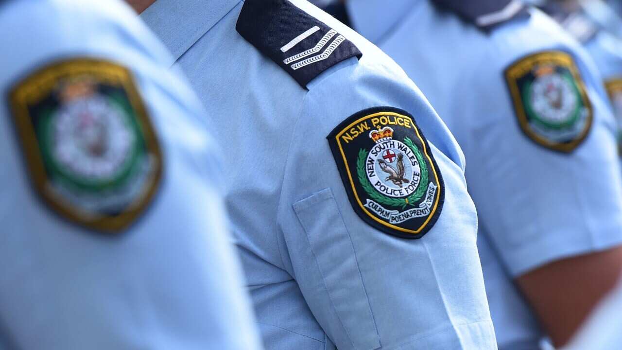 New South Wales Police badges are seen in Sydney, Thursday, Sept. 3, 2015.