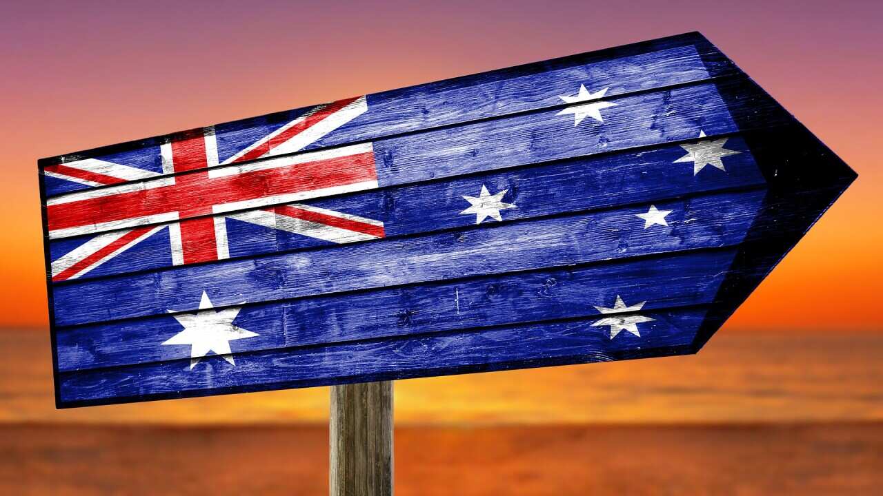 Image of an Australian flag painted on a wooden signage