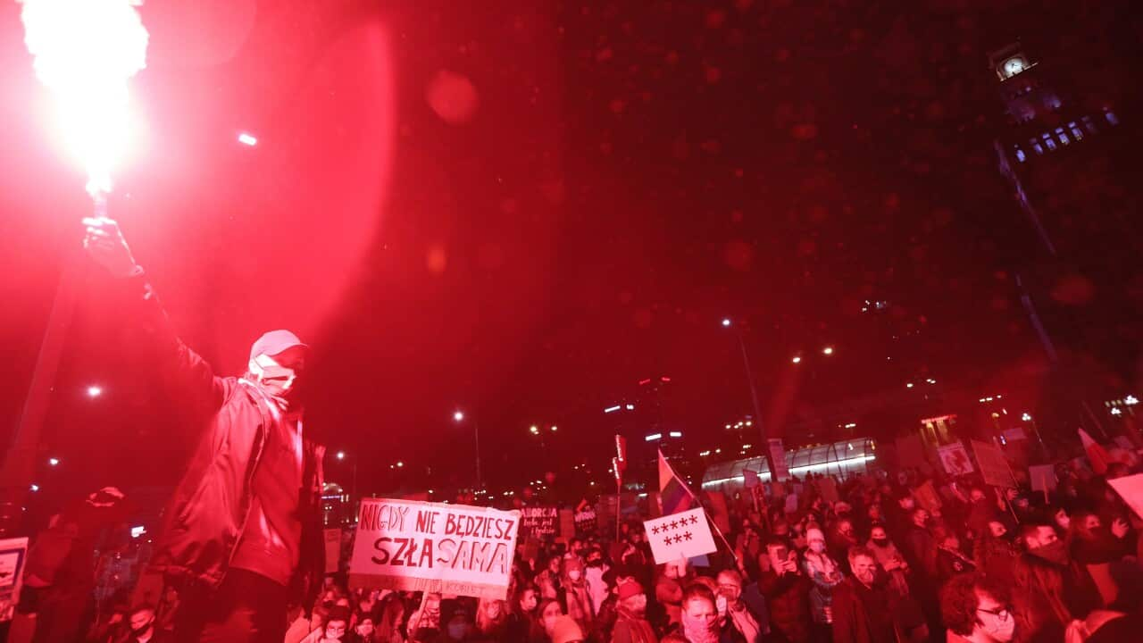 People take part in a protest against the tightening of the abortion law in Warsaw, Poland, 30 Oct, 2020