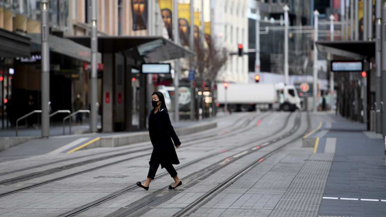 A general view of the central business district in Sydney, Saturday, July 17, 2021. The stay-at-home orders for coronavirus-hit Greater Sydney and surrounds have been tightened with the lockdown extended for a further 2 weeks. (AAP Image/Dan Himbrechts) N