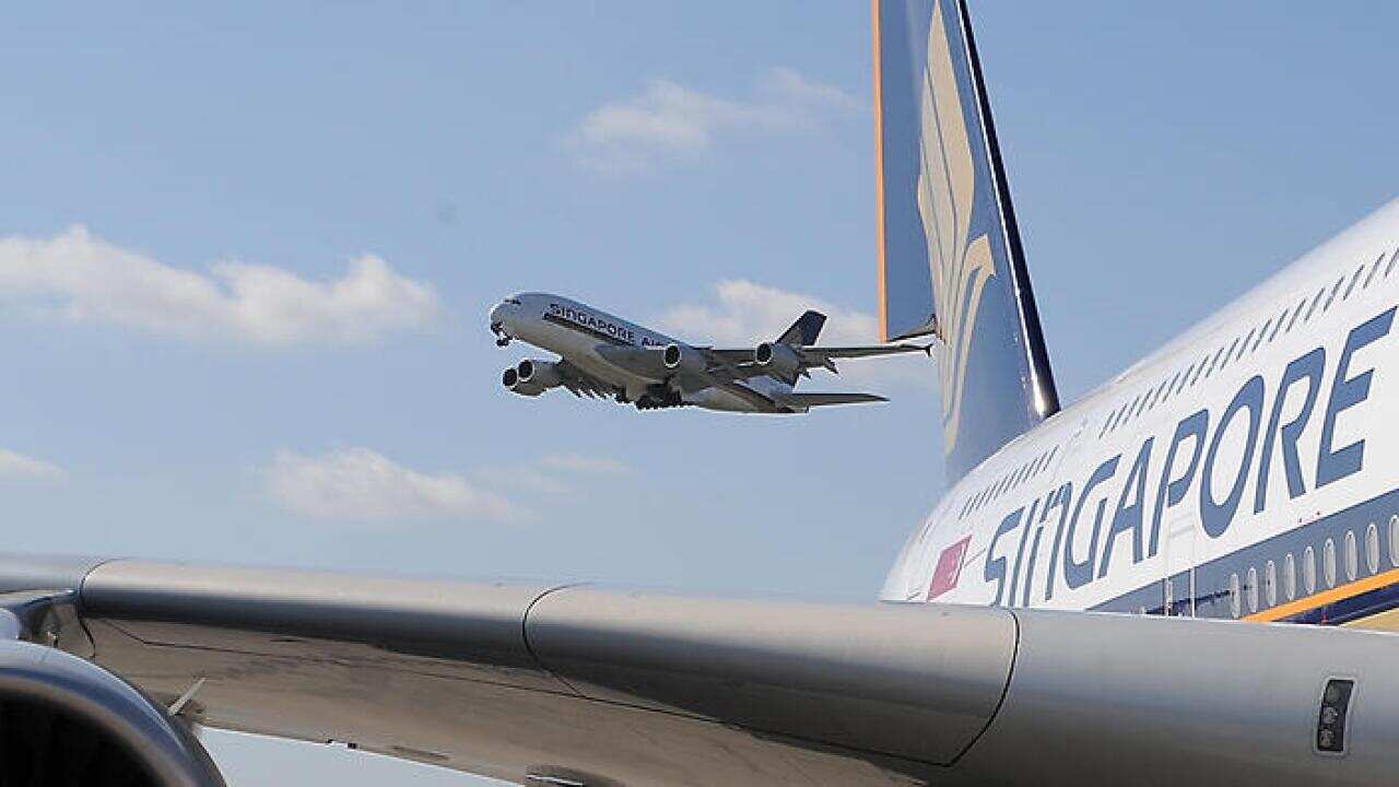 A handout image of two Singapore Airlines' Airbus A380 passenger jets 