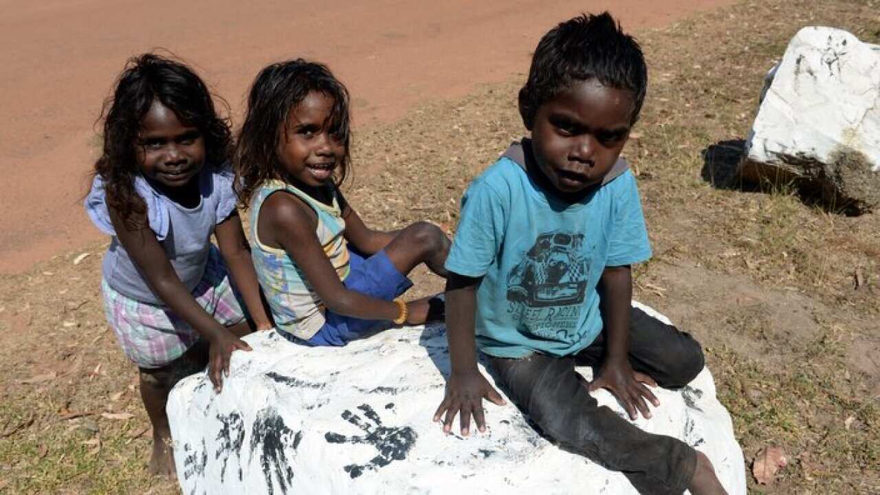 Young aboriginal children play in the indigenous community in Northern Territory.