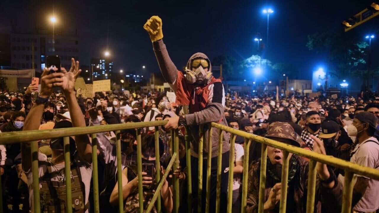 Supporters of Peruvian ousted President Martin Vizcarra demonstrate against the government of interim president Manuel Merino in Lima.