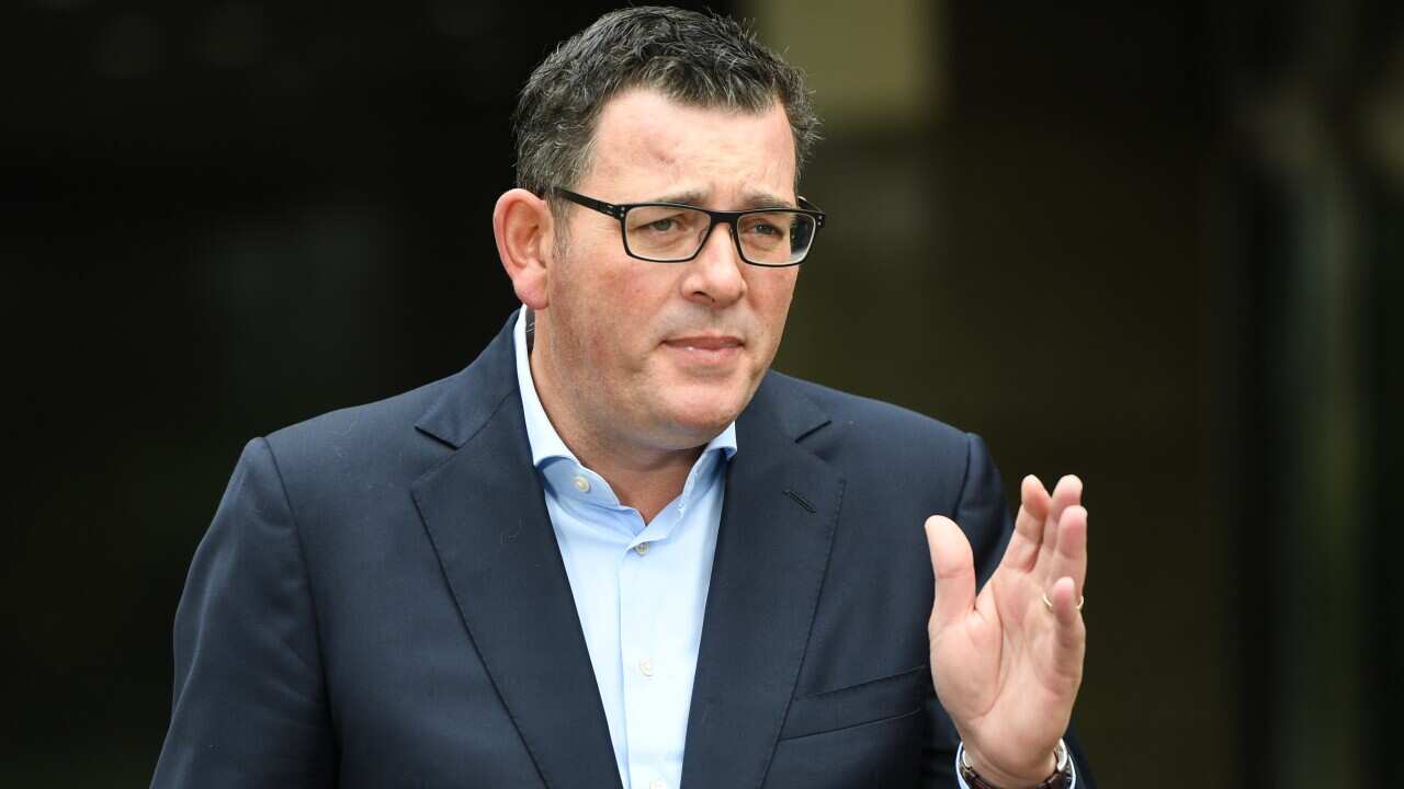 Victorian Premier Daniel Andrews speaks to the media during a press conference in Melbourne, Saturday, March 21, 2020. The premier has announced a $1.7 billion economic survival and jobs package for businesses. (AAP Image/Erik Anderson) NO ARCHIVING