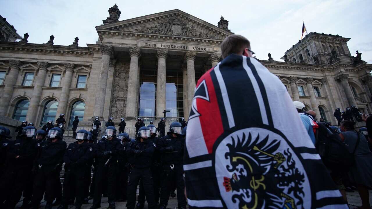 Demonstrators in front of the Reichstag building after a protest against coronavirus pandemic regulations in Berlin.