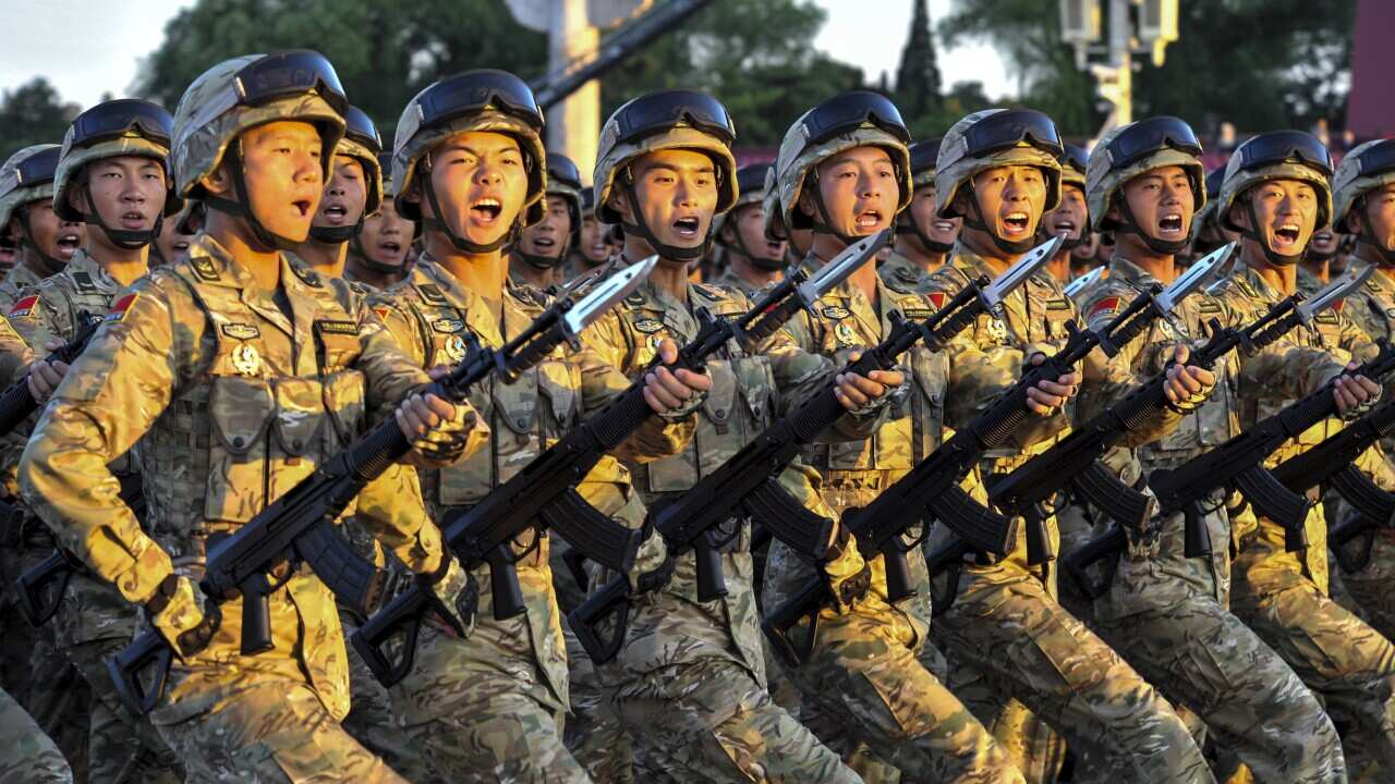 People's Liberation Army) soldiers march past the Tian'anmen Rostrum during the military parade to commemorate the 70th anniversary of the victory in the Chinese People's War of Resistance Against Japanese Aggression in Beijing