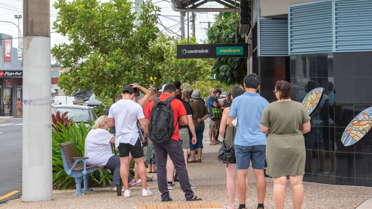 Australians queue at Centrelink during covid-19 pandemic