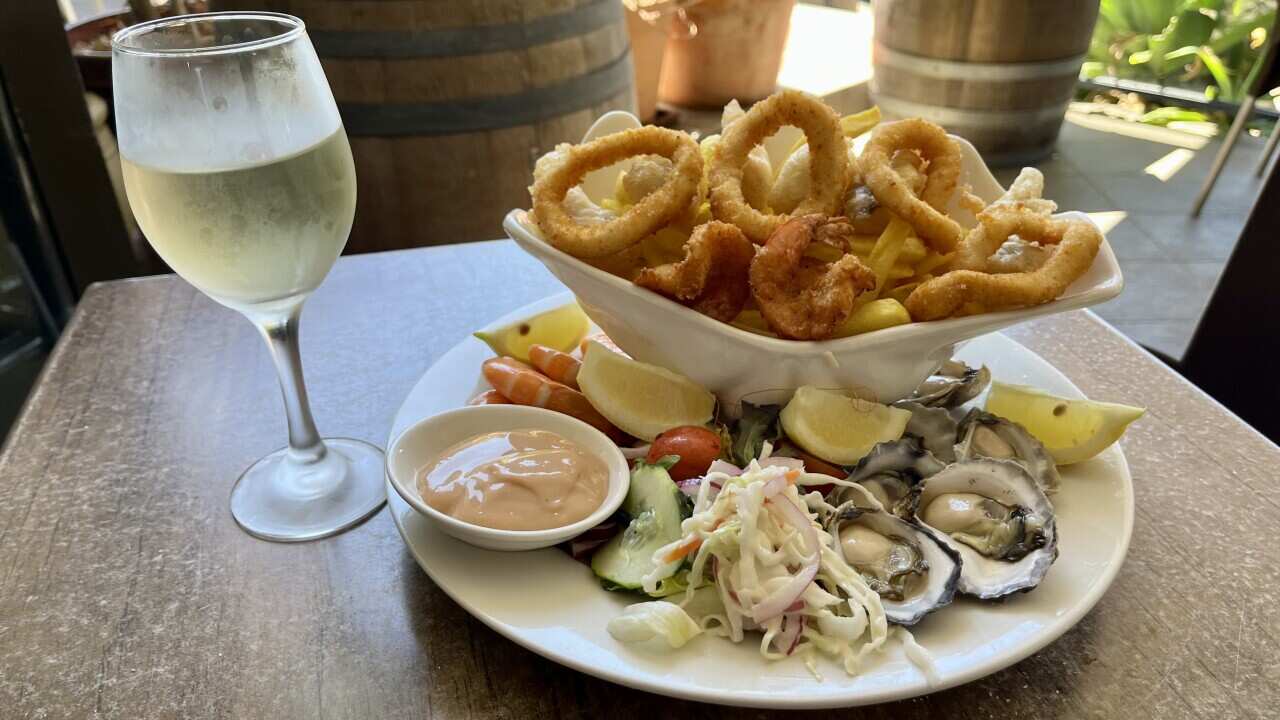 Fisherman’s Wharf Café, Ulladulla: A plate of seafood here isn't just simple fish and chips. It's local NSW South Coast history on a plate. 