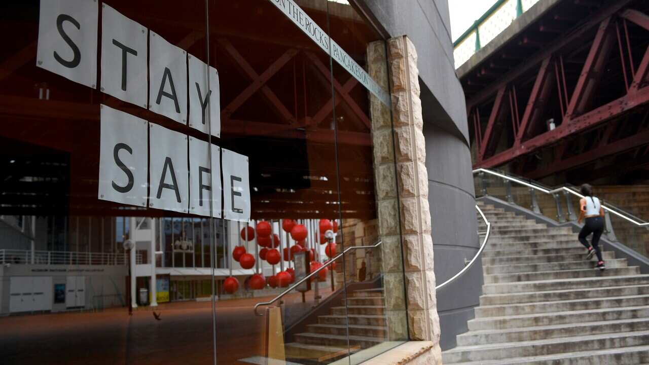 Closed businesses are seen around the usually busy Darling Harbour precinct in Sydney.