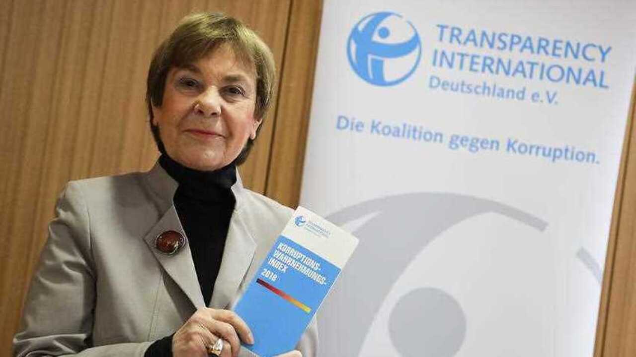 Edda Mueller, chairwoman of Transparency International Germany e.V. poses for the media with the Corruption Perceptions Index 2018. Source: AAP