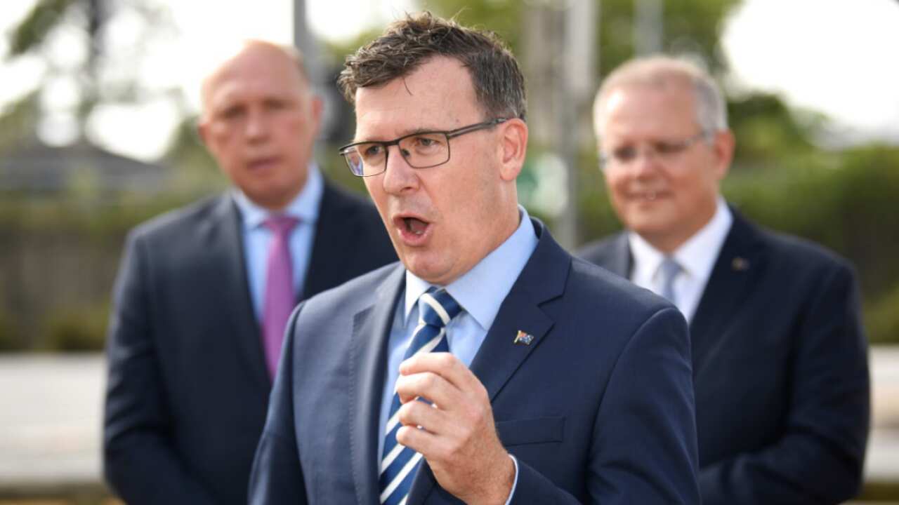 Acting Immigration Minister Alan Tudge speaks as Minister for Home Affairs Peter Dutton and Australian Prime Minister Scott Morrison.