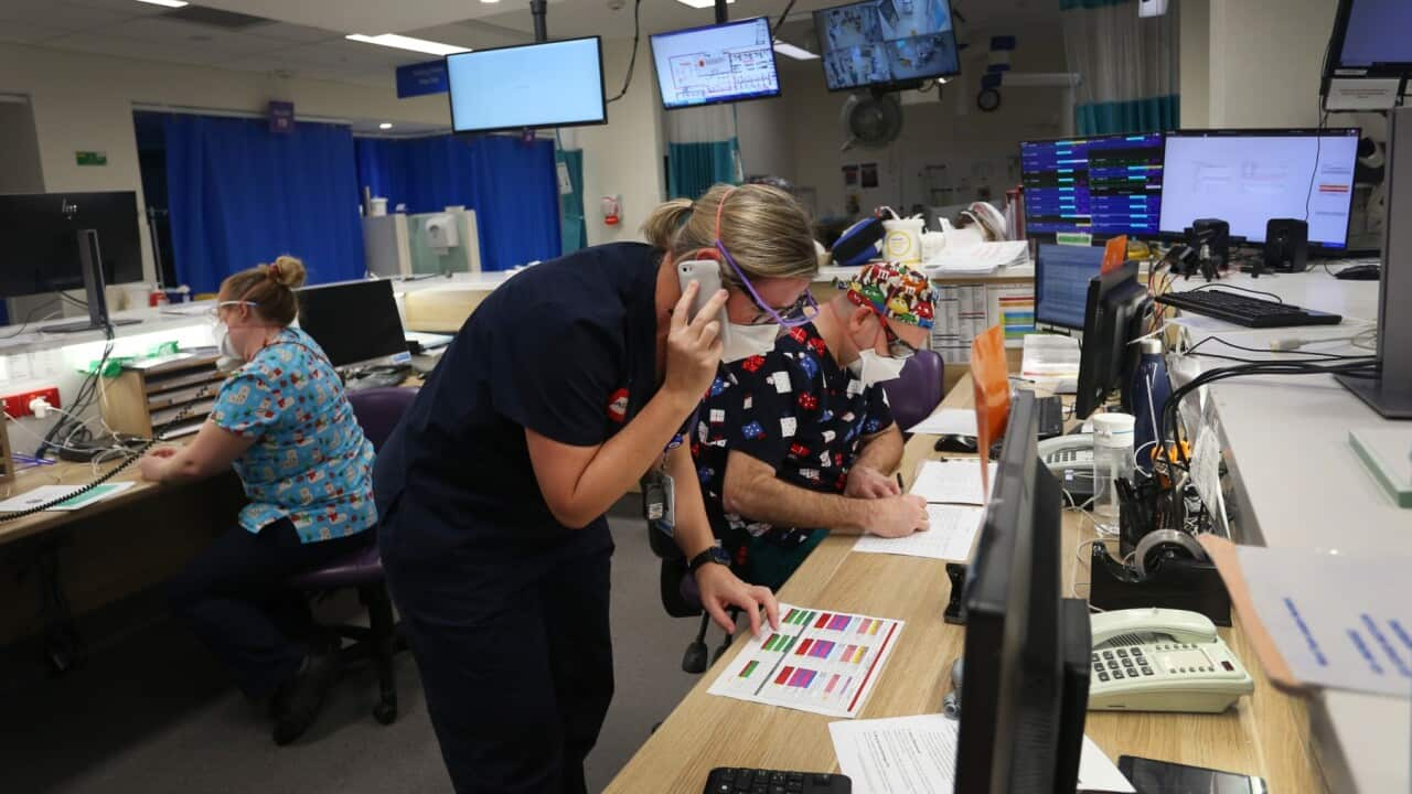 Frontline workers handle incoming patients details at St Vincent's Hospital Emergency Department. (file)