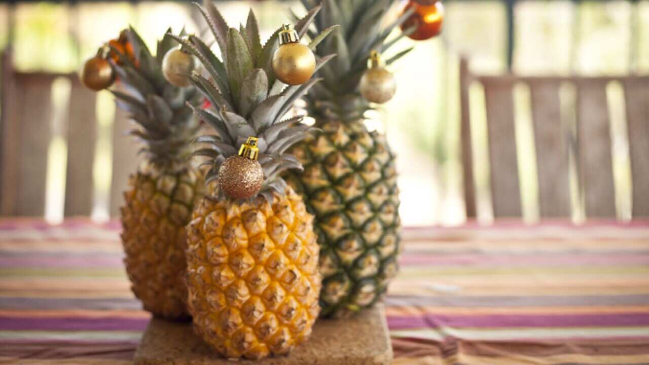 pineapples with christmas decorations