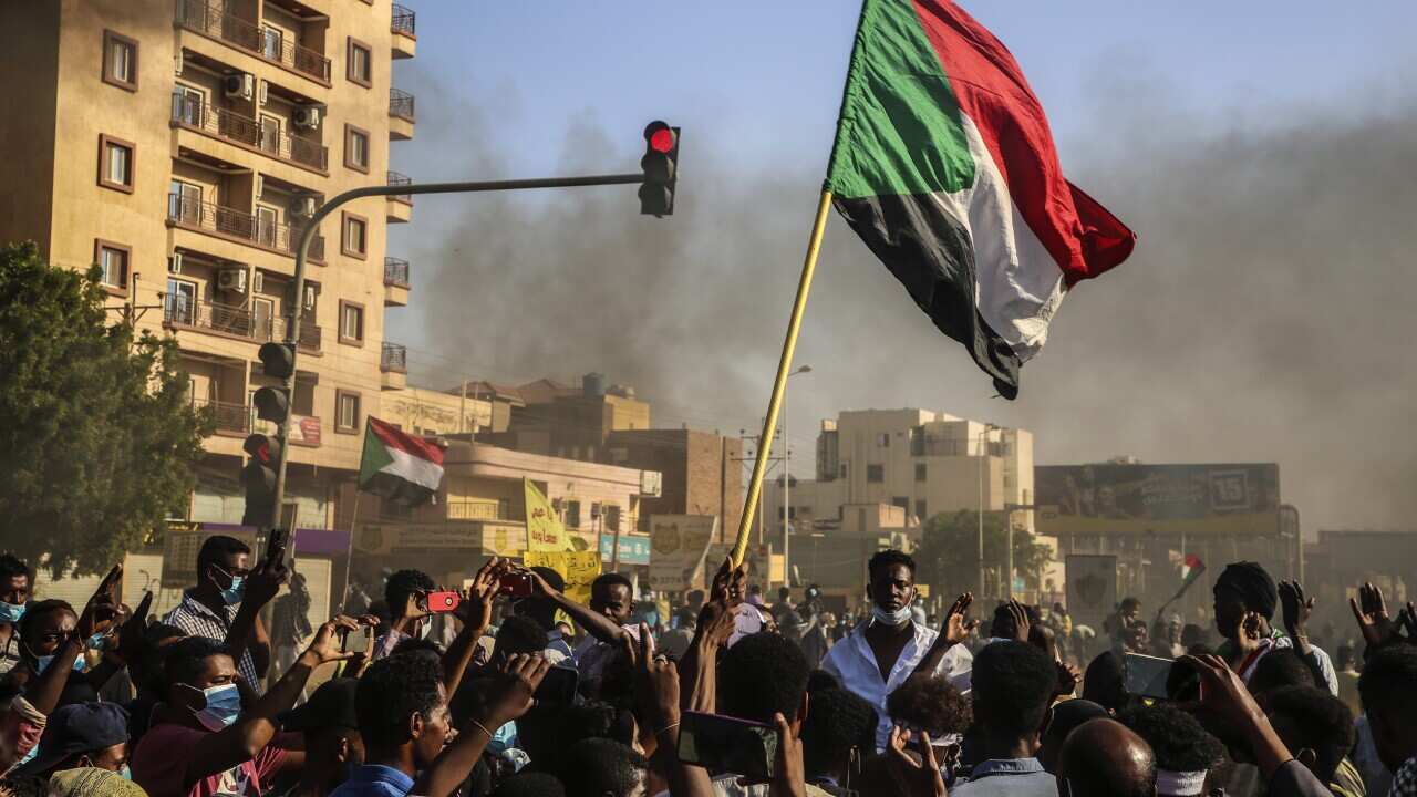 Sudanese people march during a protest against the military coup in Khartoum, Sudan, 13 November 2021.