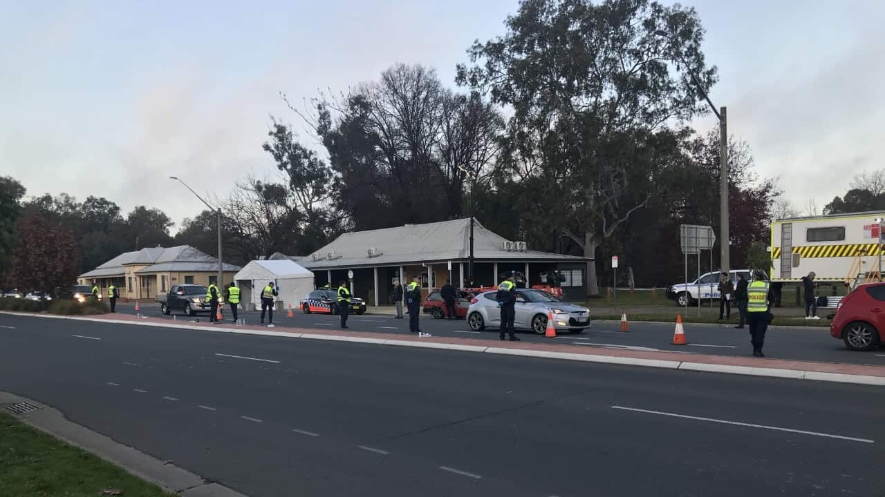 Cars entering NSW along the Albury-Wodonga border.