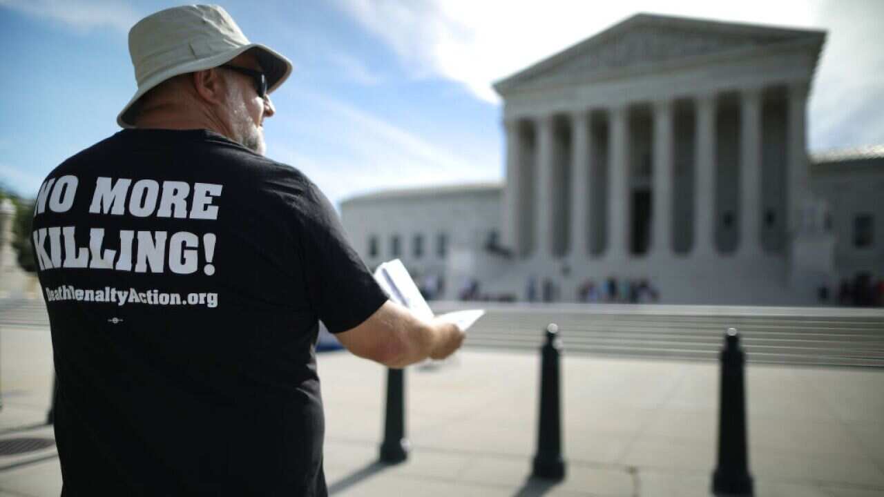 embers of the Abolitionist Action Committee during an annual protest and hunger strike against the death penalty outside the US Supreme Court.