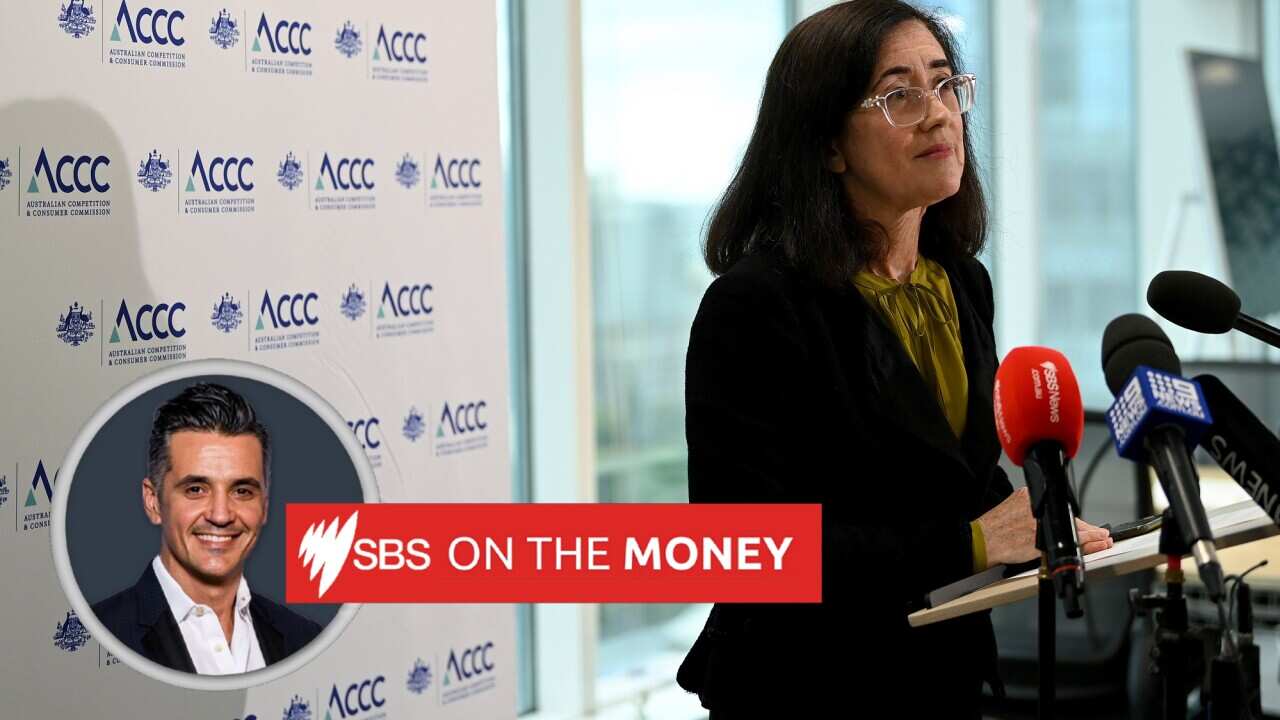 ACCC Chair stands behind a lectern