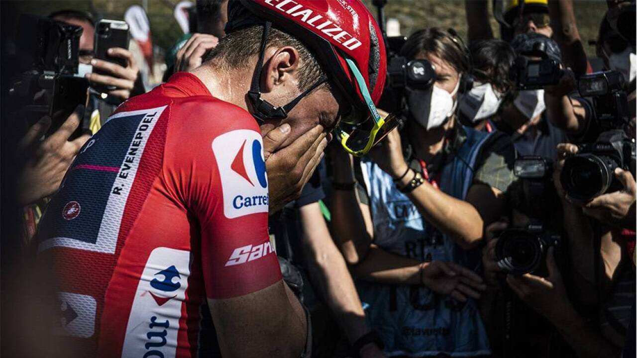 Remco Evenepoel breaks down in tears after securing the leader's red jersey on Stage 20 of La Vuelta 2022.