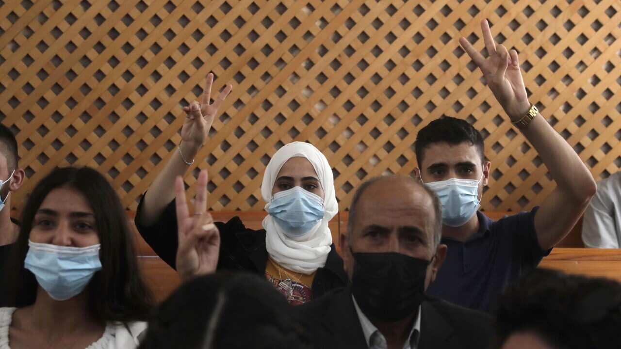 Palestinian residents of the Sheikh Jarrah neighborhood in East Jerusalem prior to a hearing at the Supreme Court, 2 August, 2021. 