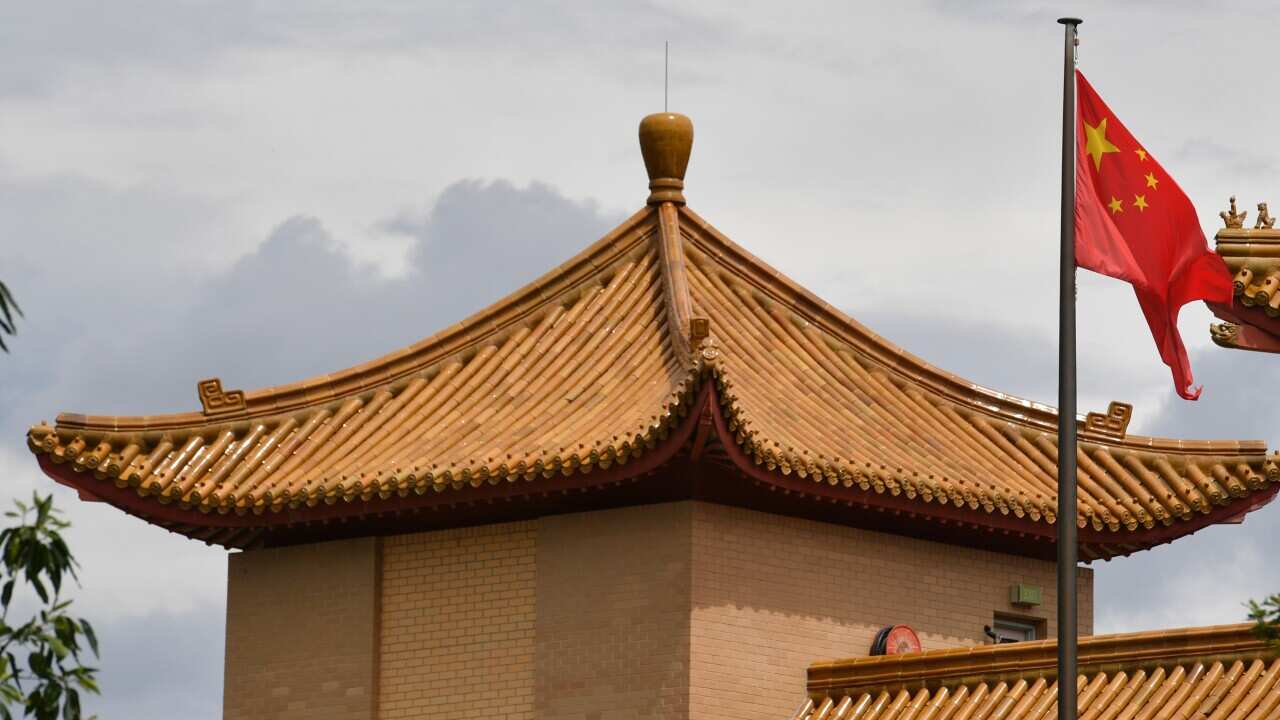 China's flag is seen at the Chinese embassy in Canberra in December 2020.