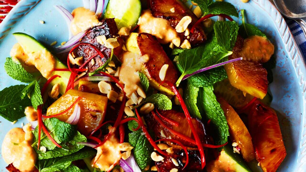 Caramelised pineapple salad with spicy peanut dressing